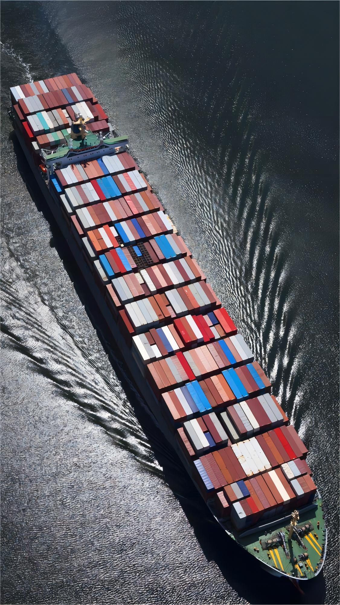 Cargo ship at a busy port representing sea freight logistics